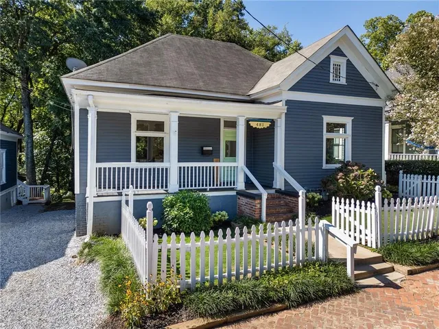 a front view of a house with a porch