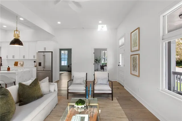 a living room with furniture and a table