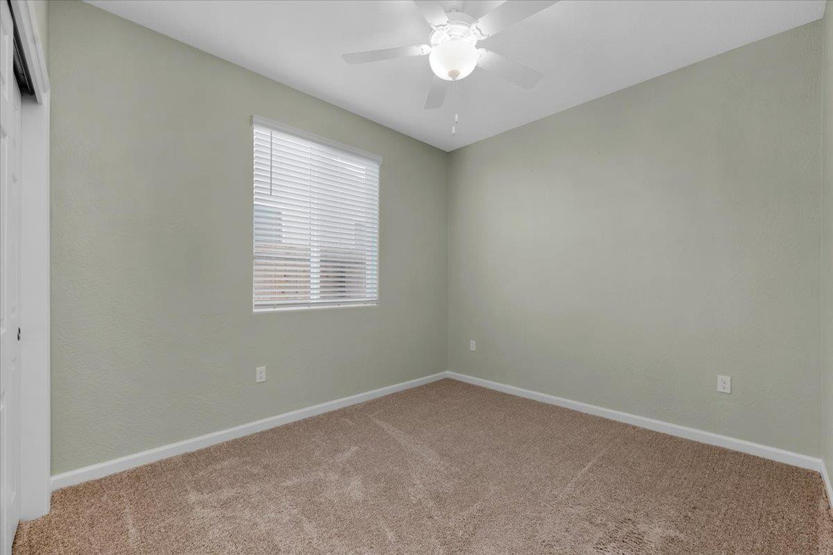 1183 Encore Way West Madera, CA 93636 - Photo 25 of 46 an empty room with a window