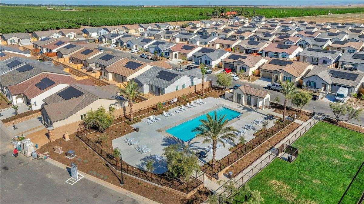 1183 Encore Way West Madera, CA 93636 - Photo 6 of 46 an aerial view of a house with a garden