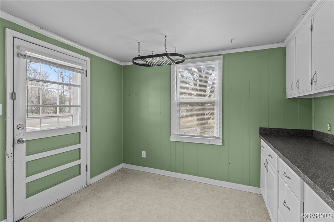 911 Maple Street Ashland, VA 23005 - Photo 23 of 35 a kitchen that has a lot of windows in it