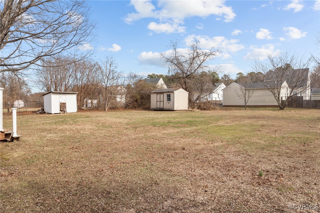 911 Maple Street Ashland, VA 23005 - Photo 32 of 35 a view of a yard with a large tree
