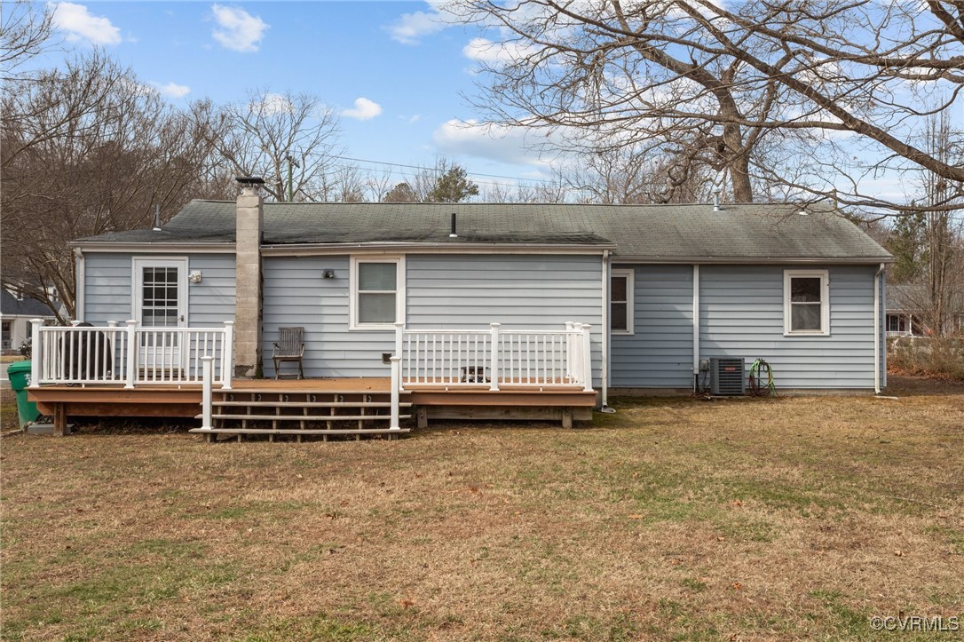 911 Maple Street Ashland, VA 23005 - Photo 34 of 35 a view of a house with a yard and wooden fence