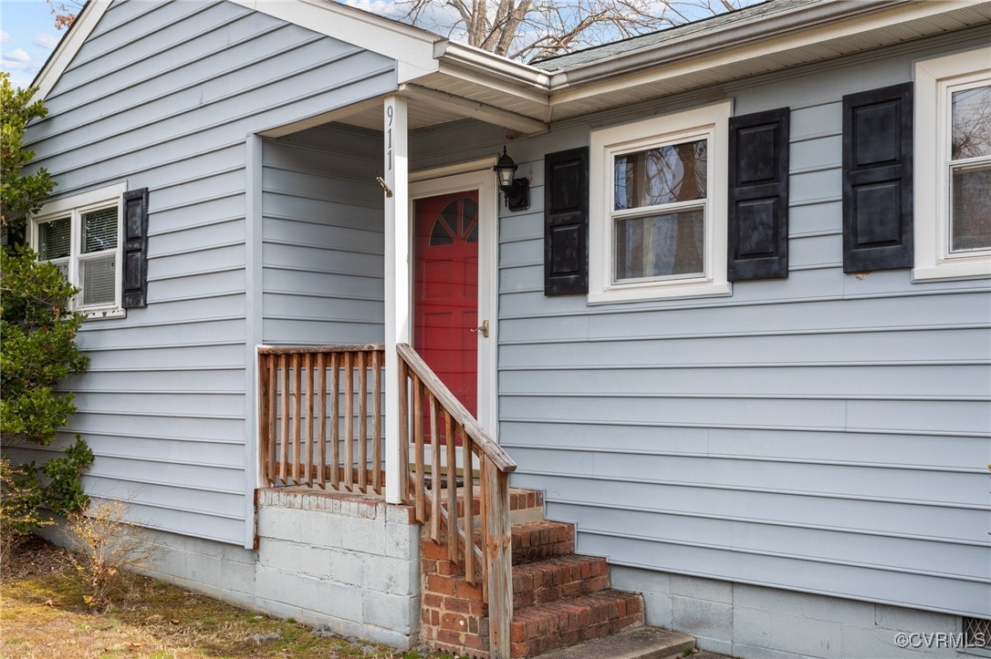 911 Maple Street Ashland, VA 23005 - Photo 6 of 35 a view of wooden house with a window and stairs