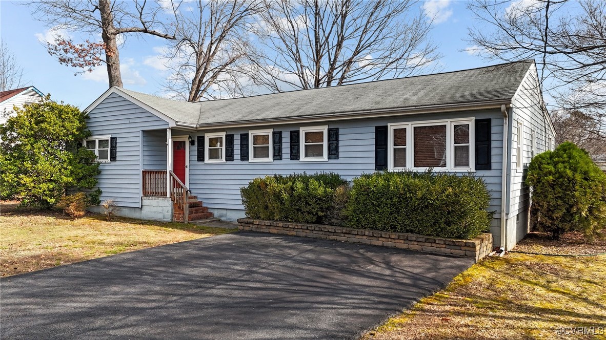 911 Maple Street Ashland, VA 23005 - Photo 7 of 35 a view of a house with a yard