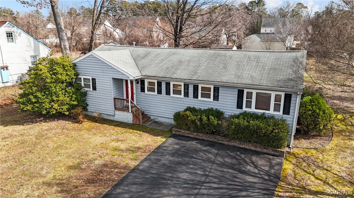 911 Maple Street Ashland, VA 23005 - Photo 8 of 35 a house view with a outdoor space