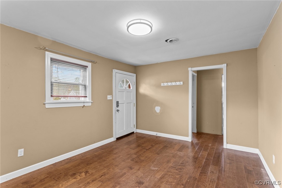 911 Maple Street Ashland, VA 23005 - Photo 10 of 35 a view of an empty room with wooden floor and closet