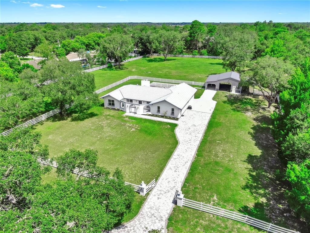 a view of a garden with an outdoor space