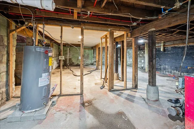 a view of a room with wooden walls