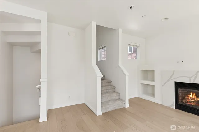 a kitchen with a stove and a fireplace