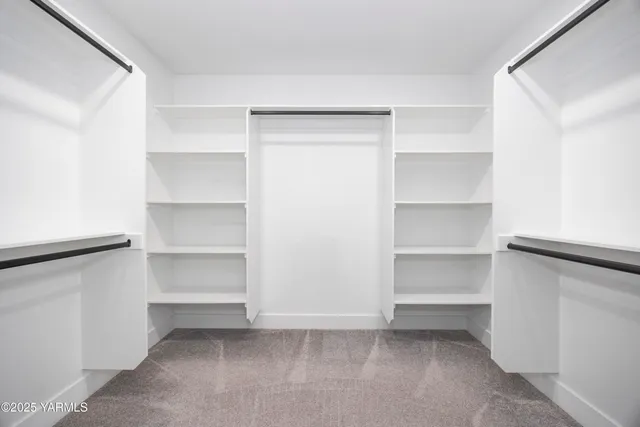 a view of an empty walk in closet