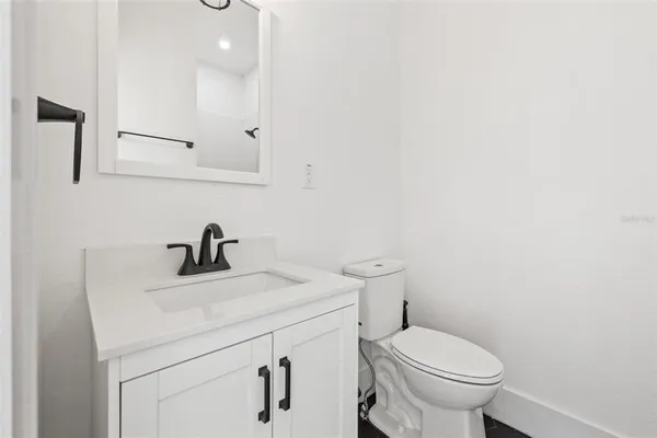 a bathroom with a sink and a toilet