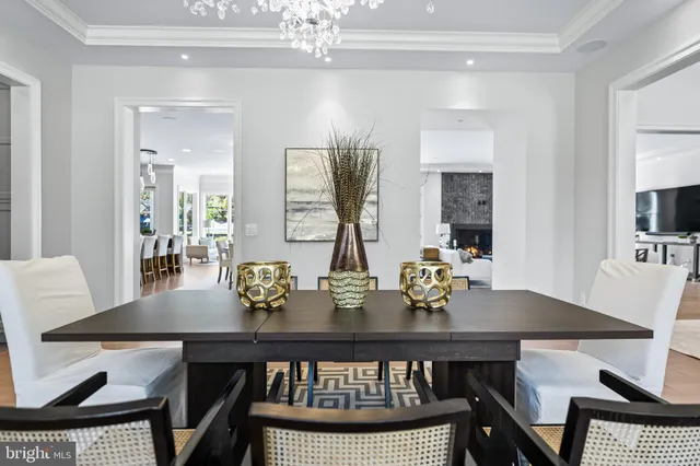 a bathroom with a sink vanity mirror and toilet