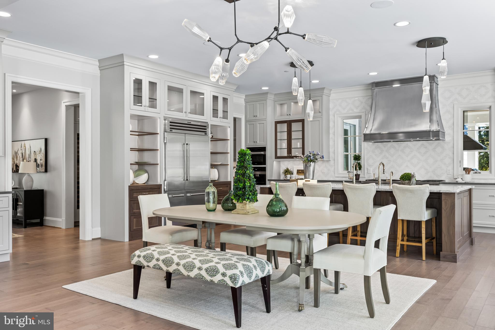 314 Golf Course Road Owings Mills, MD 21117 - Photo 27 of 112 a view of a dining room with furniture and wooden floor