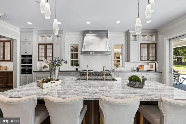 a bedroom with two beds and a window