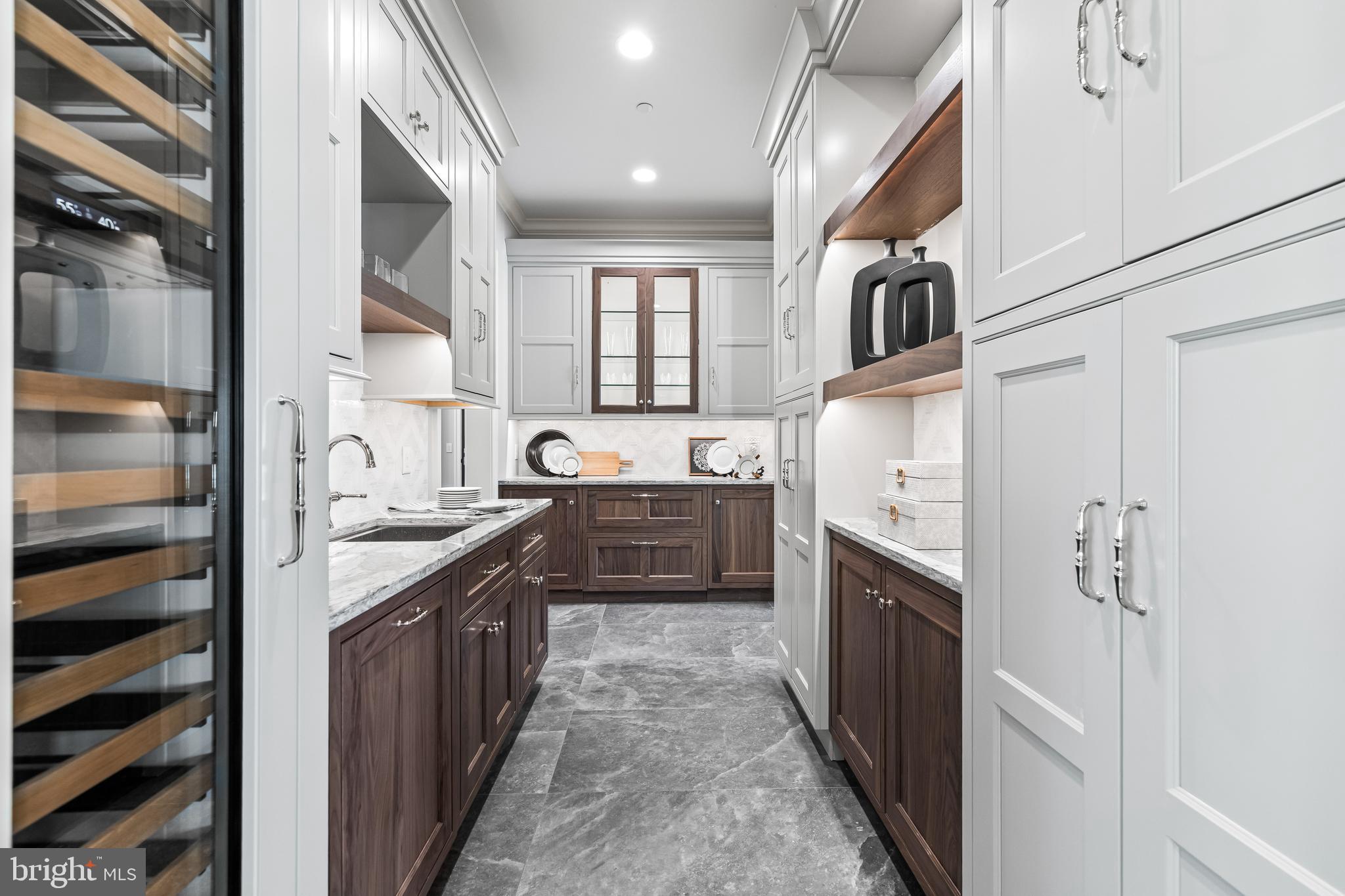 314 Golf Course Road Owings Mills, MD 21117 - Photo 35 of 112 a kitchen with stainless steel appliances granite countertop a stove and a sink