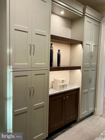 a bedroom with two beds and a window