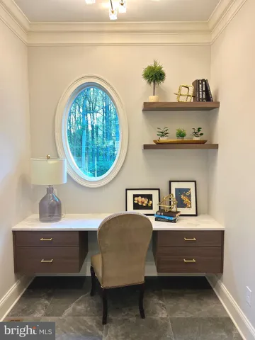 an empty room with a hard wood floor and a window