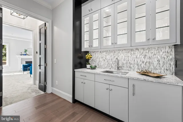 an empty room with a empty space and windows