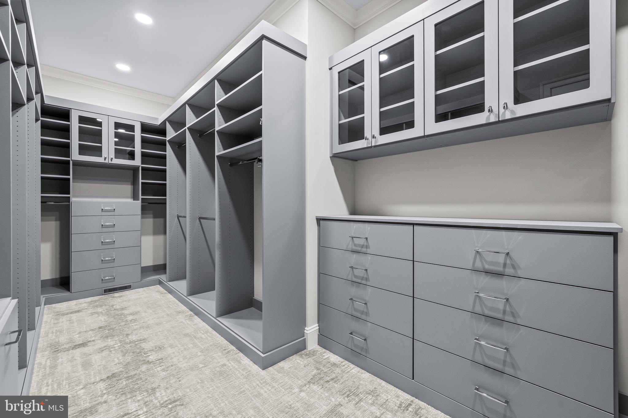 314 Golf Course Road Owings Mills, MD 21117 - Photo 56 of 112 a view of walk in closet with clothes and shoes