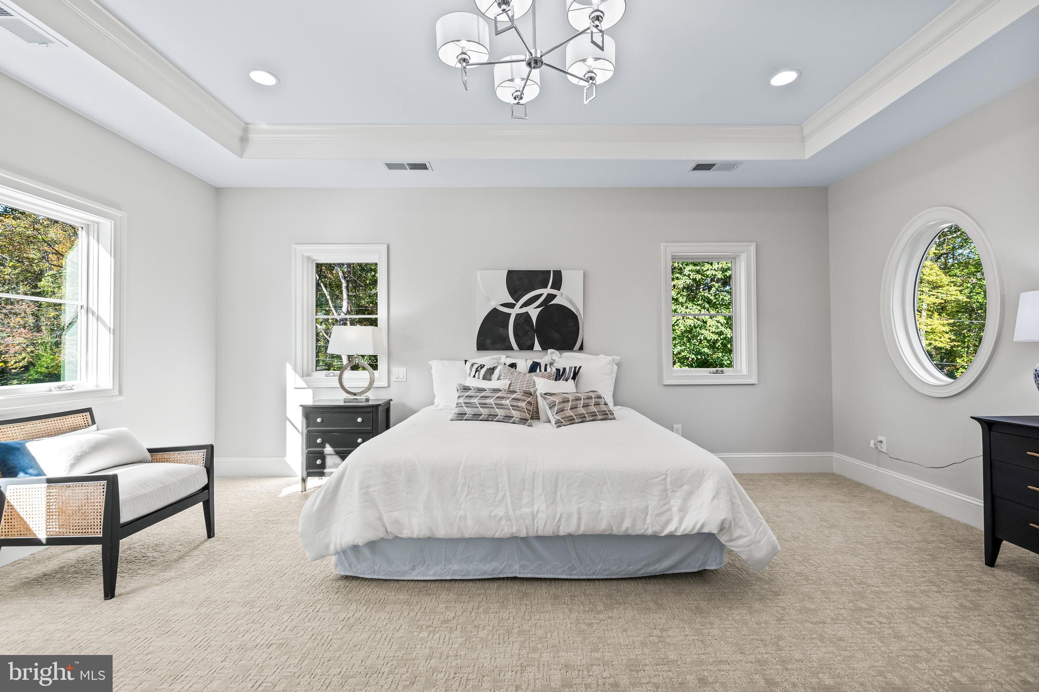 314 Golf Course Road Owings Mills, MD 21117 - Photo 76 of 112 a bedroom with a bed a dresser next to a window