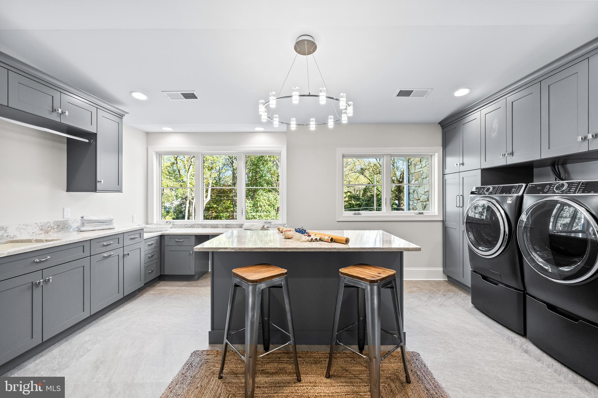 314 Golf Course Road Owings Mills, MD 21117 - Photo 82 of 112 a kitchen with kitchen island granite countertop a sink and a stove
