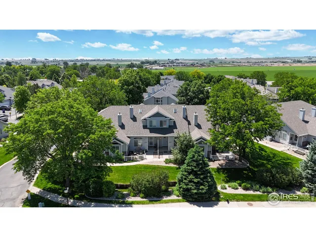 a outdoor living space with furniture and a potted plant