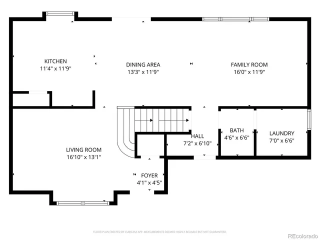 a picture of a bench in front of a building
