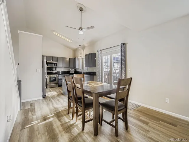 a view of a dining room with furniture