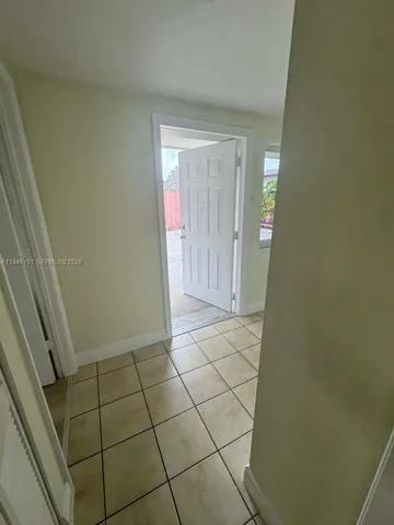 a view of a livingroom with wooden floor