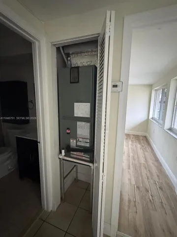 a view of kitchen and utility room