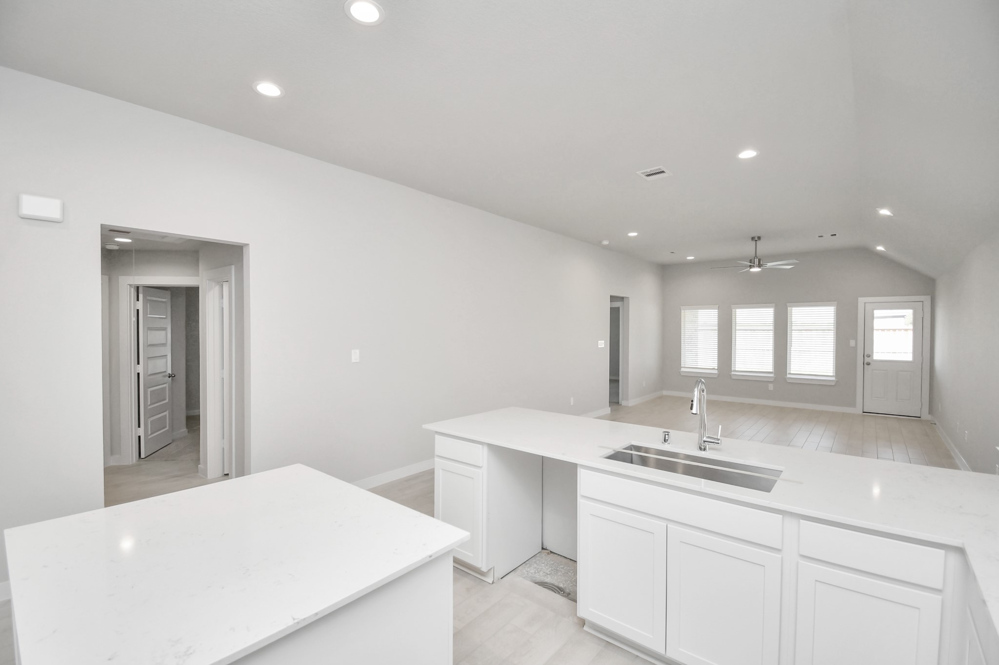 14619 Diamond Dove Lane Houston, TX 77049 - Photo 16 of 33 All of this overlooks your expansive family room, creating a perfect space for culinary delights and family gatherings. Sample photo of completed home with similar floor plan. Actual colors and selections may vary.