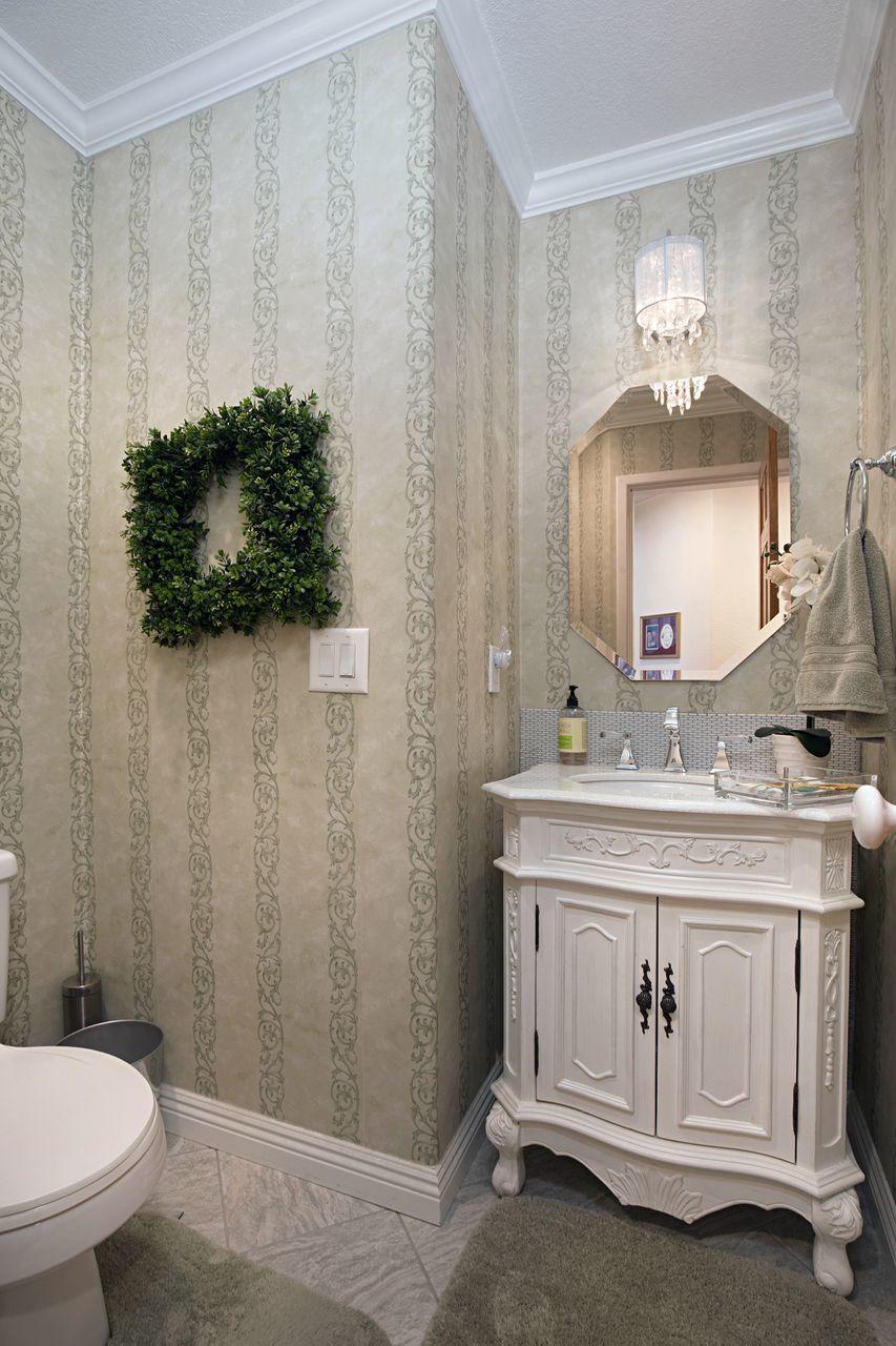 53810 Tollgate Road Idyllwild, CA 92549 - Photo 14 of 30 a bathroom with a toilet a sink and a mirror