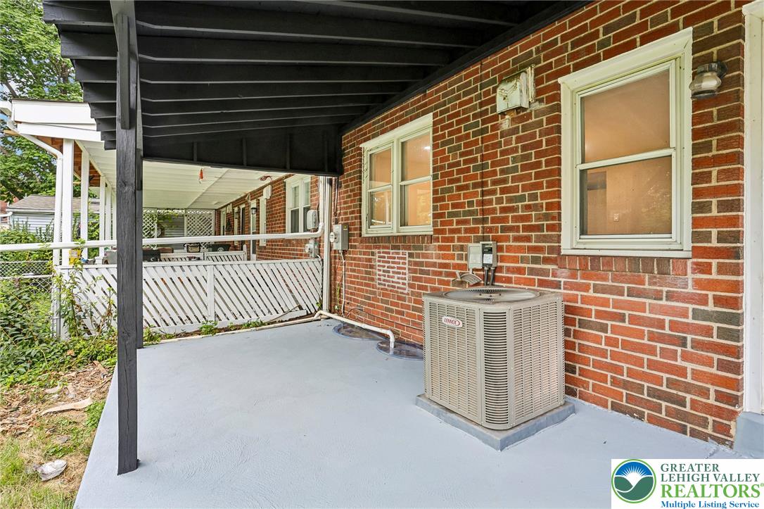 4008 Powell Road Brookhaven, PA 19015 - Photo 31 of 36 A spacious covered patio provides a delightful outdoor living area, perfect for entertaining.