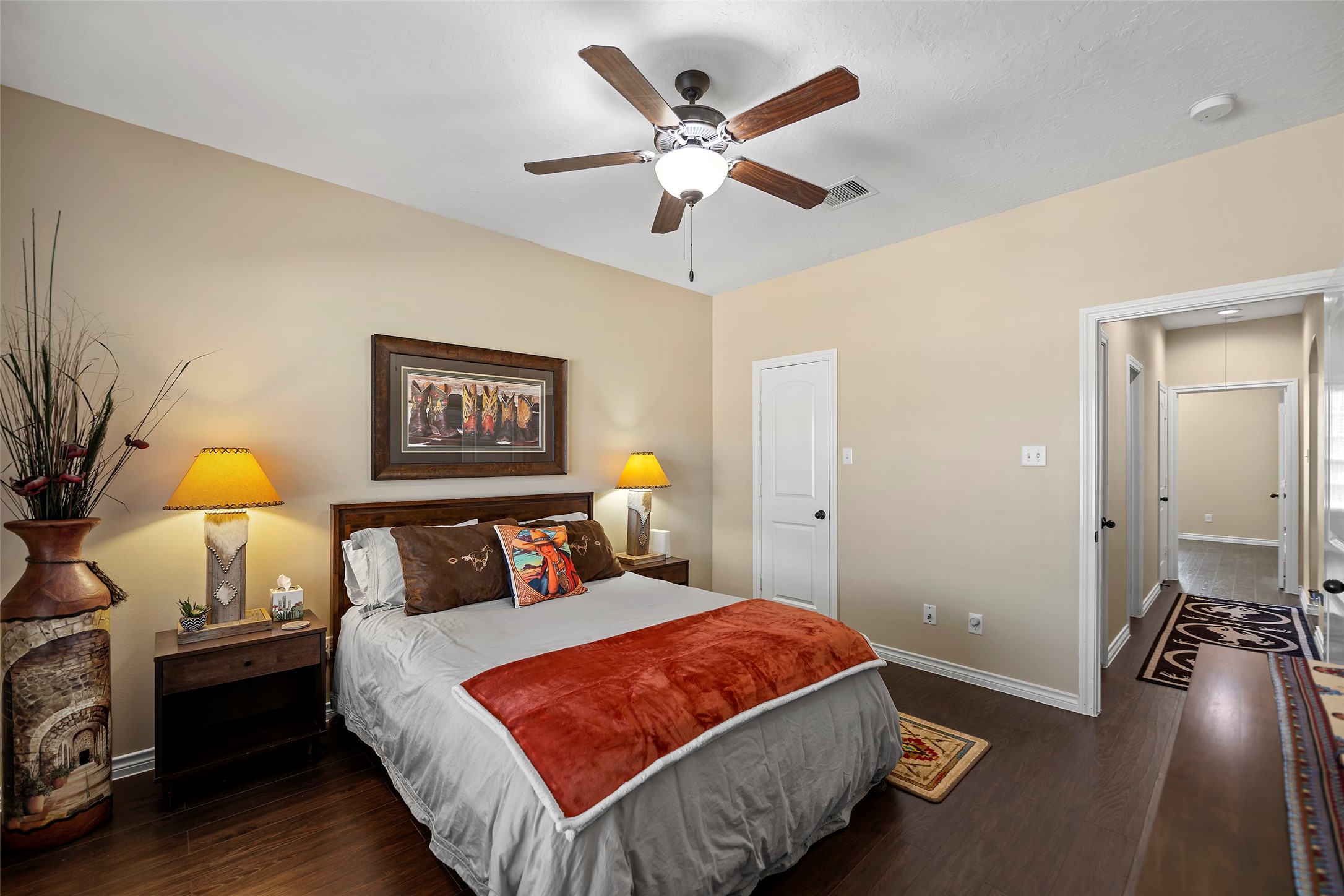 23530 Hargrave Road Hockley, TX 77447 - Photo 12 of 46 a bedroom with a bed and wooden floor