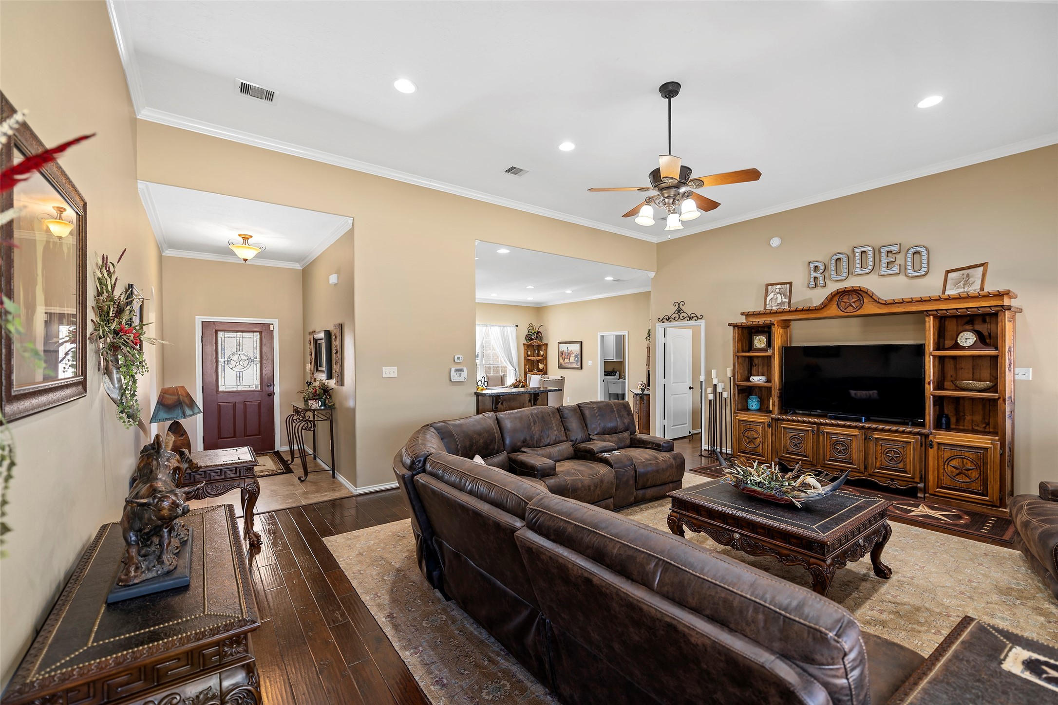 23530 Hargrave Road Hockley, TX 77447 - Photo 13 of 46 a living room with furniture and a flat screen tv