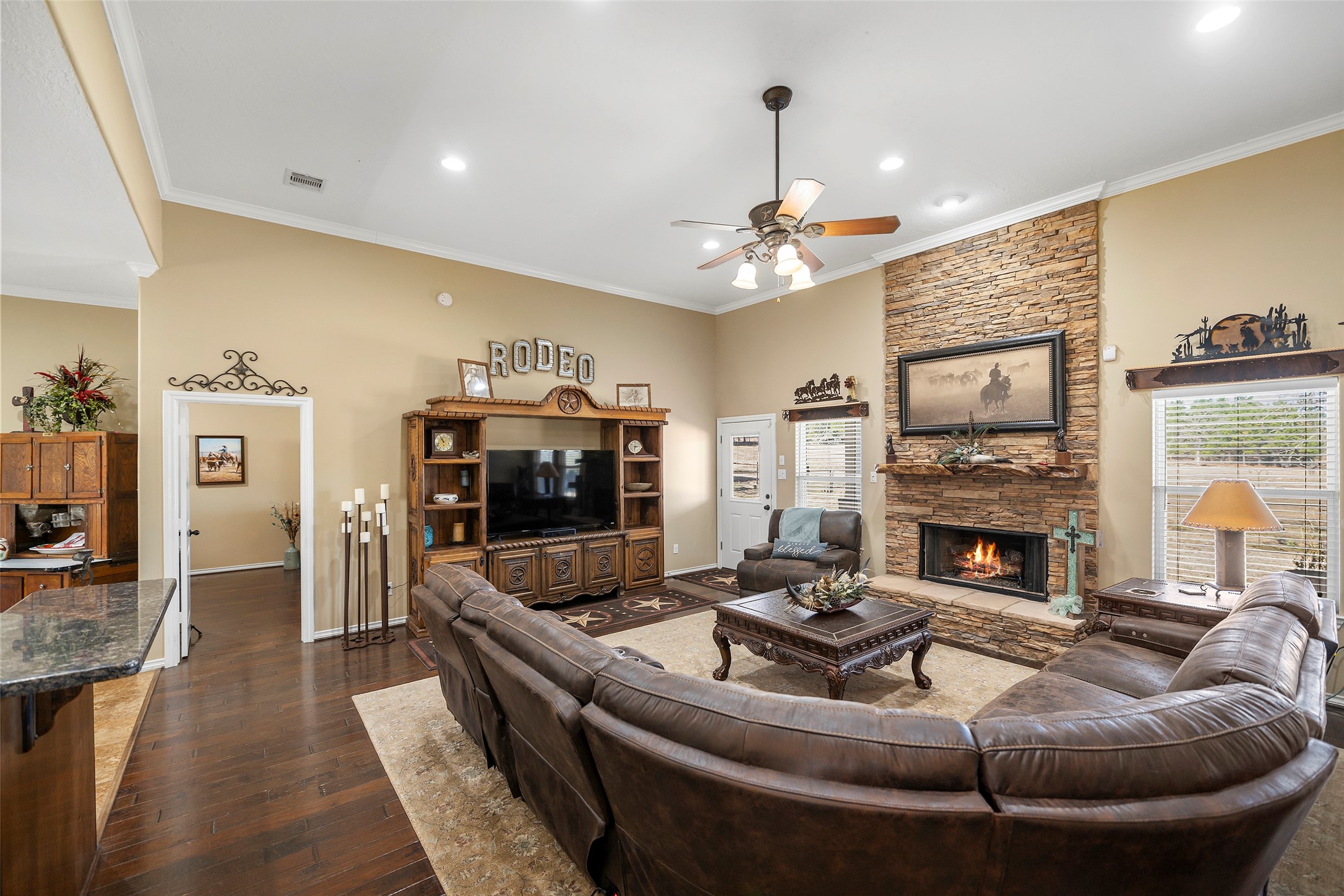 23530 Hargrave Road Hockley, TX 77447 - Photo 14 of 46 a living room with furniture and a fireplace
