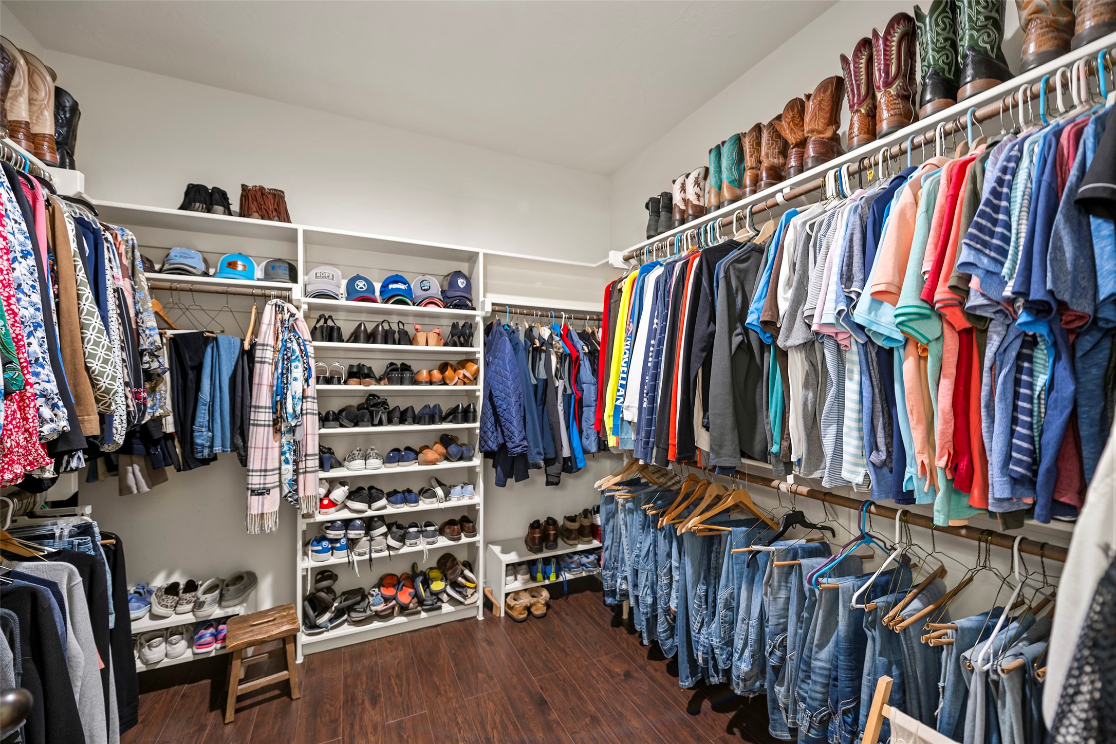 23530 Hargrave Road Hockley, TX 77447 - Photo 17 of 46 a view of walk in closet with clothes and shoes