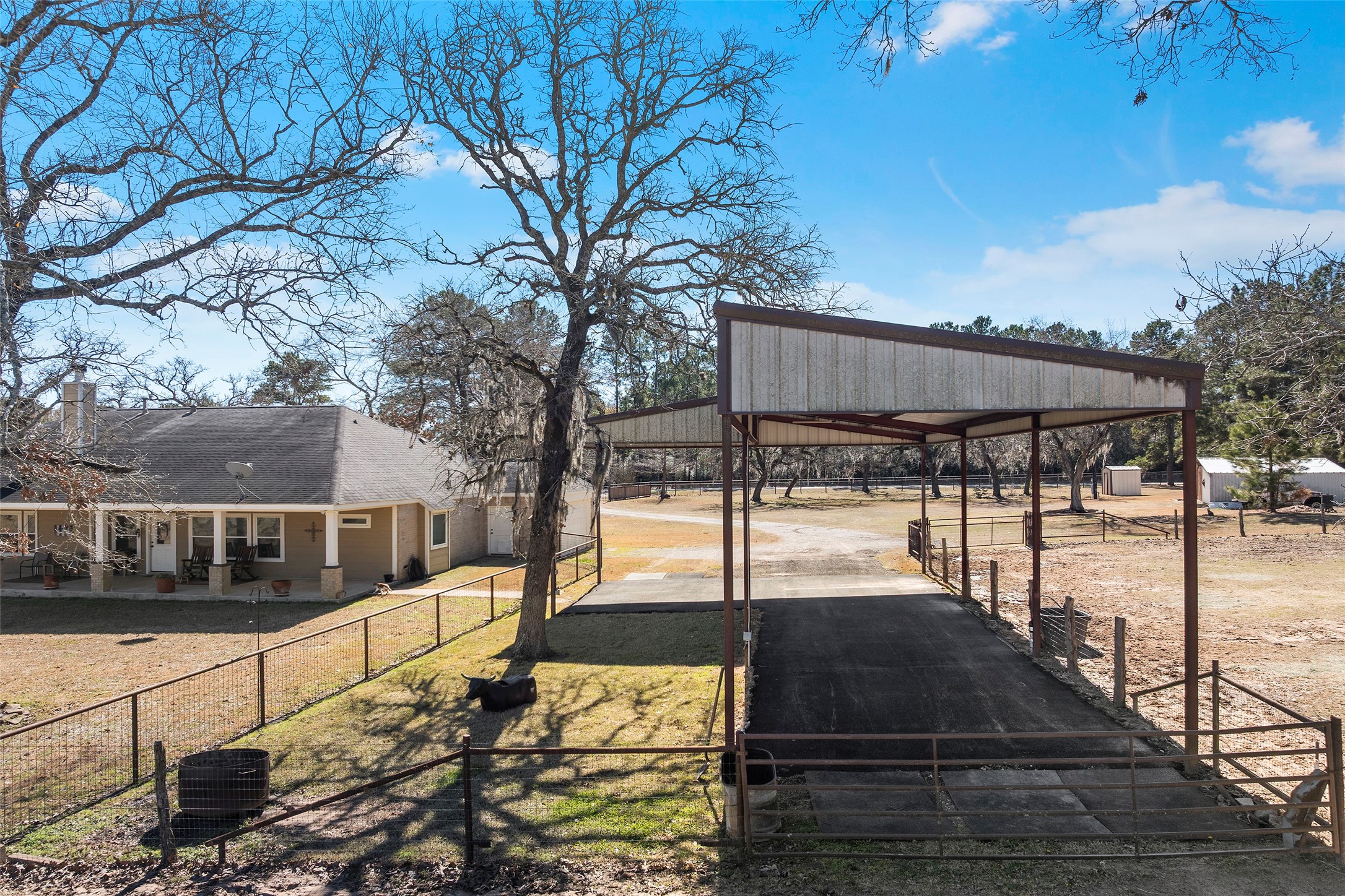 23530 Hargrave Road Hockley, TX 77447 - Photo 38 of 46 a view of a swimming pool with a patio