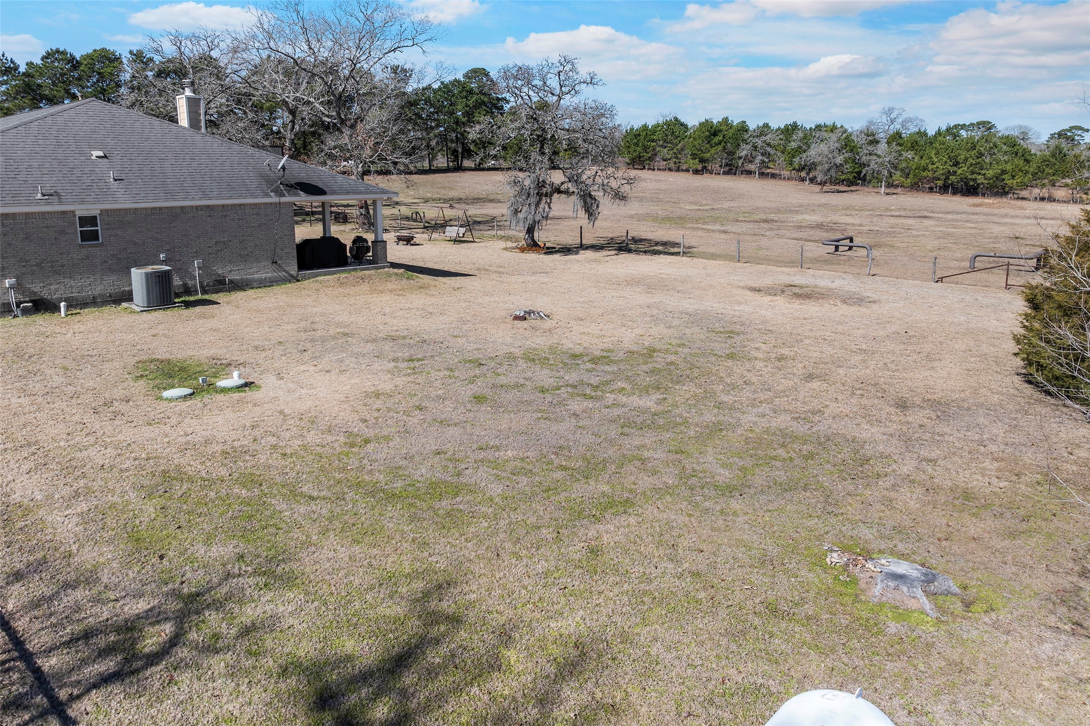 23530 Hargrave Road Hockley, TX 77447 - Photo 40 of 46 a view of a backyard of a house