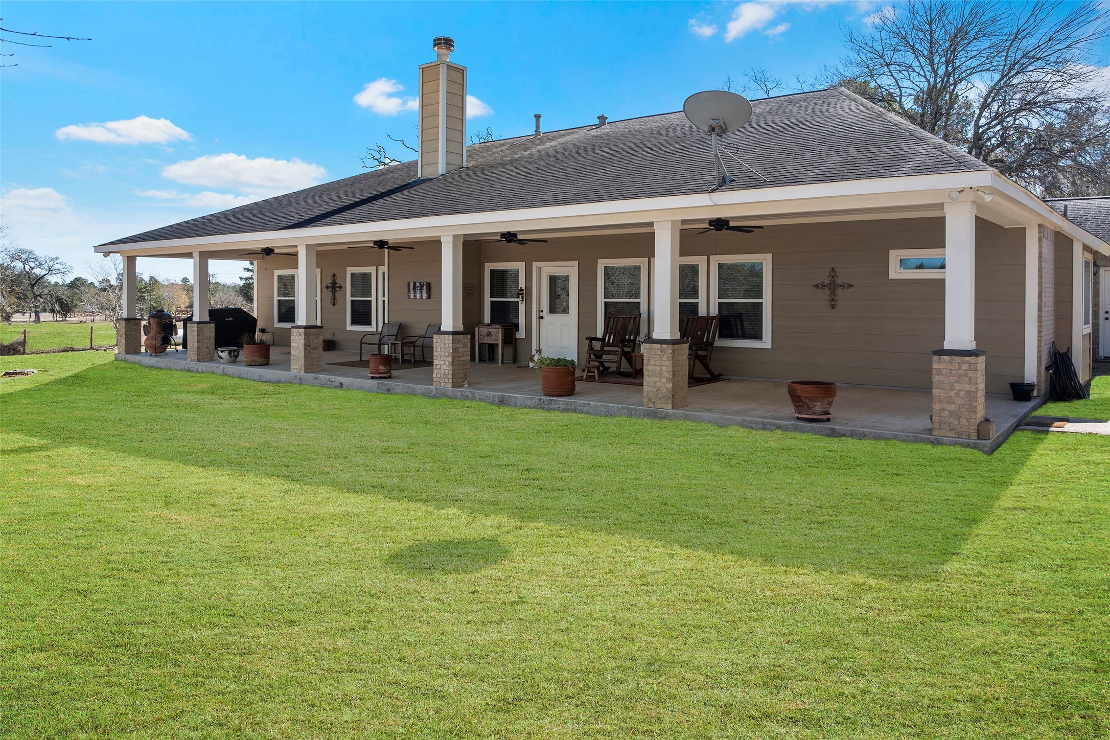 23530 Hargrave Road Hockley, TX 77447 - Photo 46 of 46 a front view of a house with garden and porch
