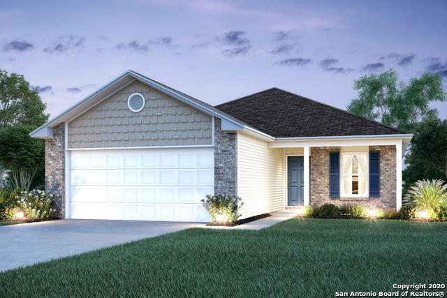 14606 Hackamore Way Elmendorf, TX 78112 - Photo 1 of 1 a house view with a garden space