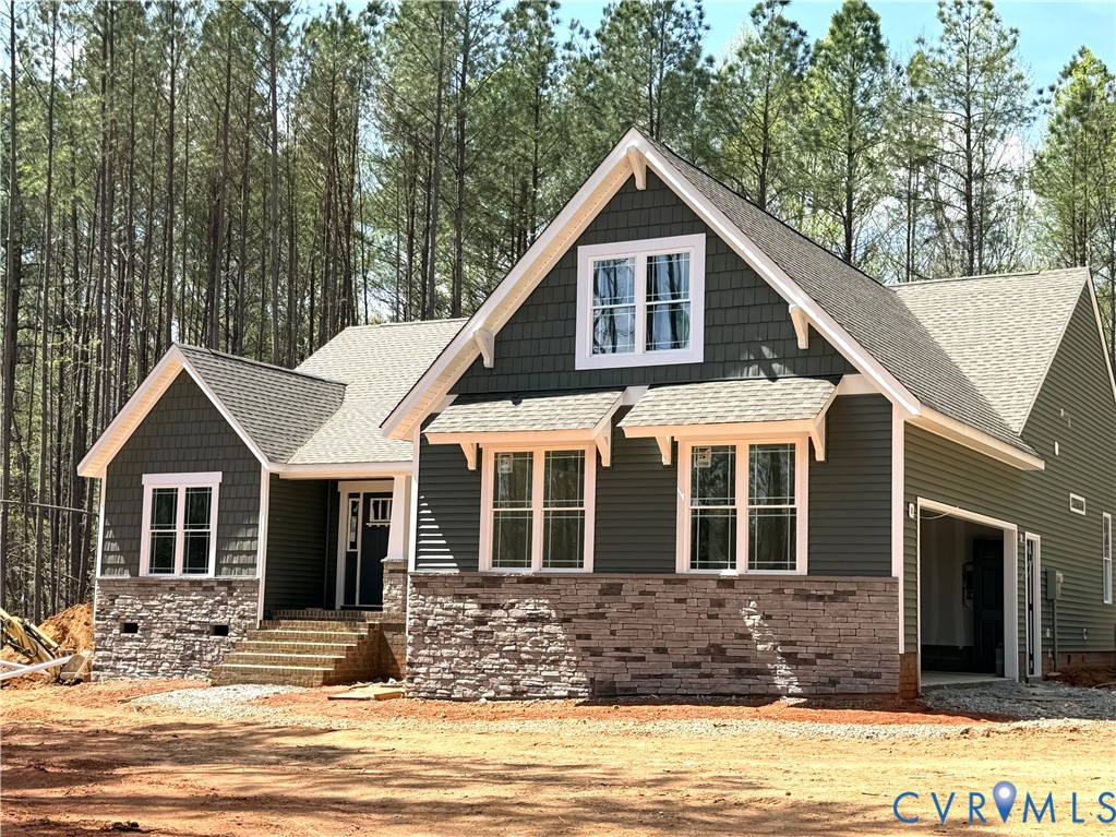 2203 Walnut Tree Boulevard Powhatan, VA 23139 - Photo 1 of 1 a front view of a house with a yard