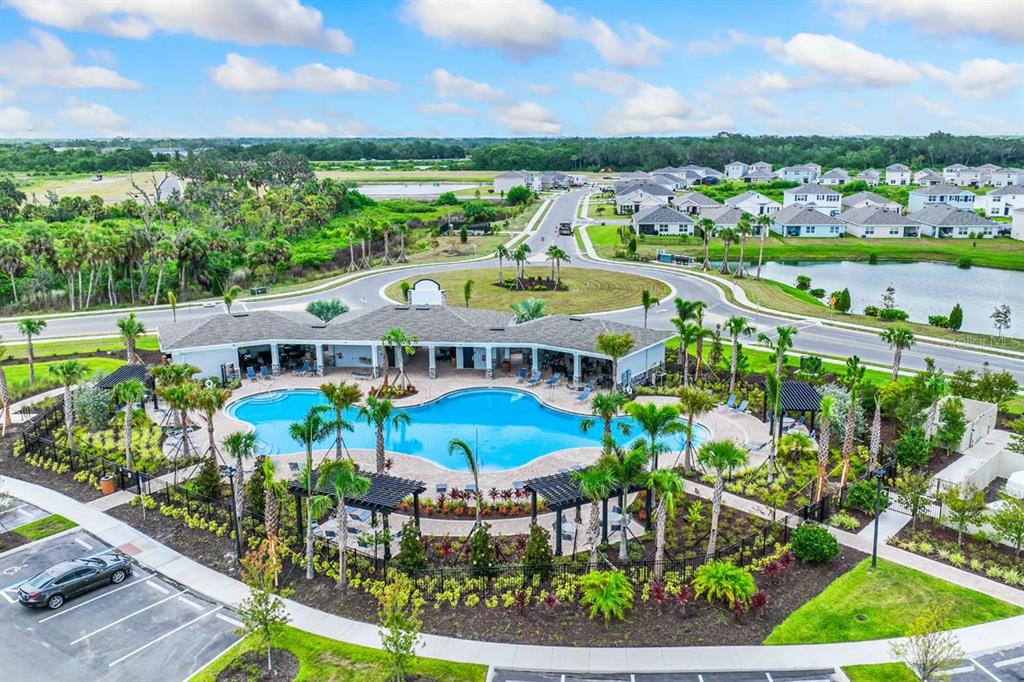 5820 Silver Feather Way Palmetto, FL 34221 - Photo 31 of 32 a view of a swimming pool and outdoor seating