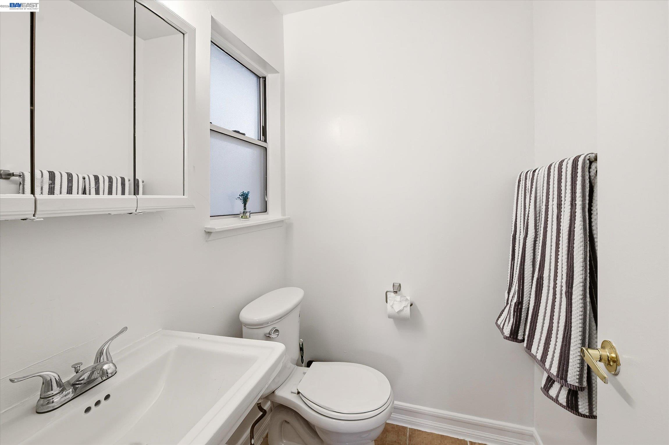 442 James Street Livermore, CA 94551 - Photo 12 of 28 a bathroom with a sink and a toilet
