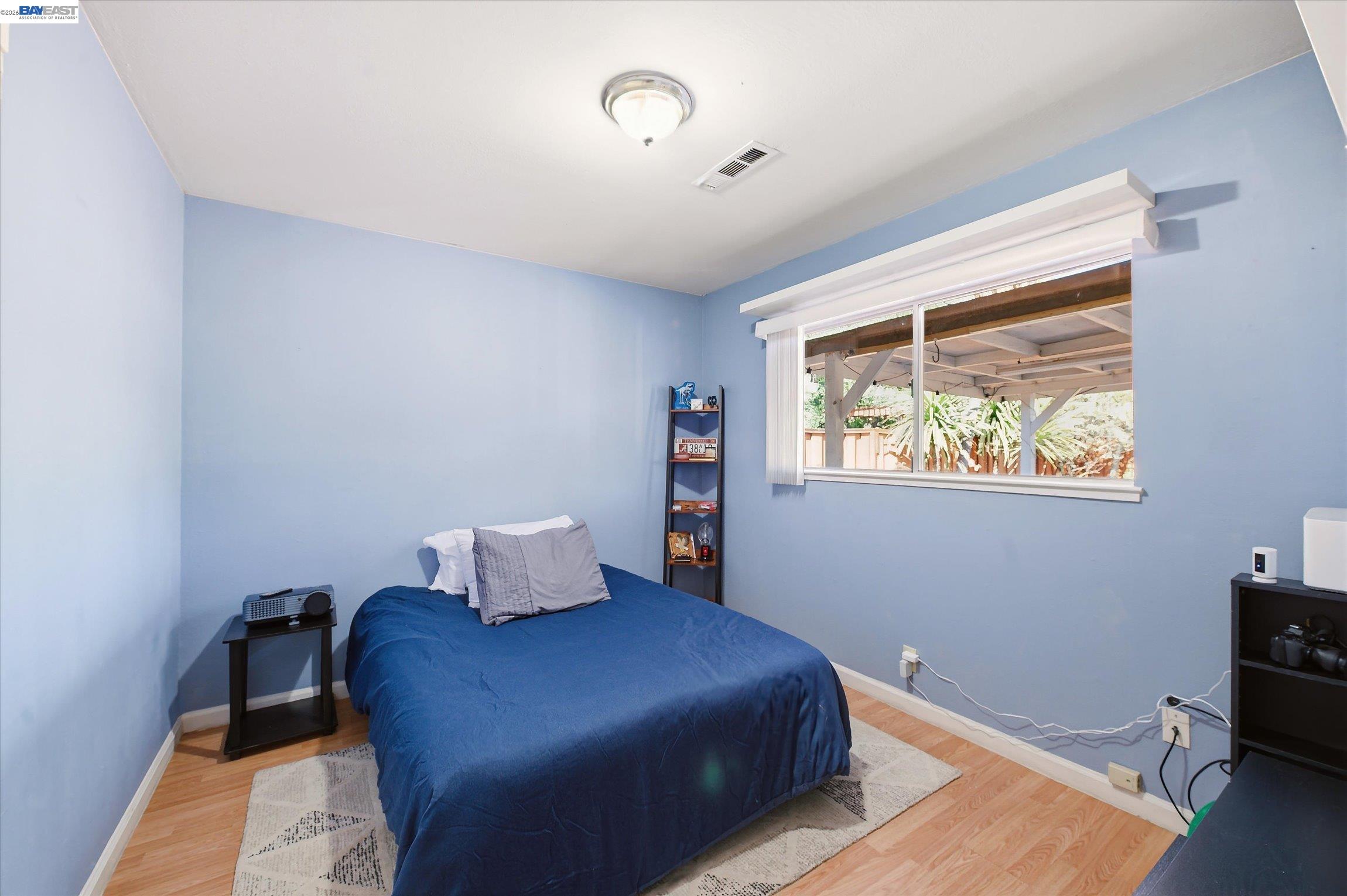 442 James Street Livermore, CA 94551 - Photo 13 of 28 a bedroom with a bed and window