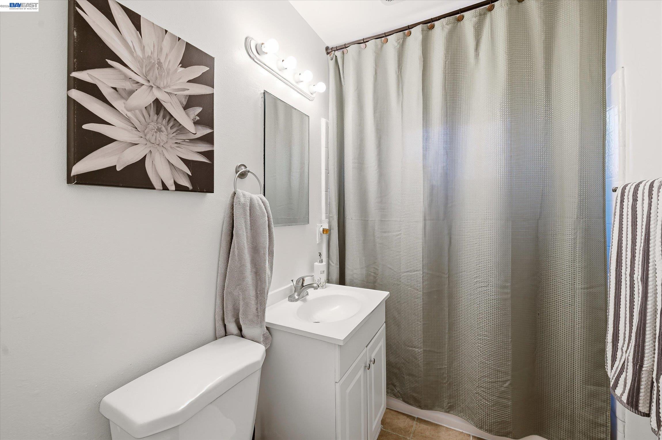 442 James Street Livermore, CA 94551 - Photo 15 of 28 a bathroom with a toilet sink and vanity
