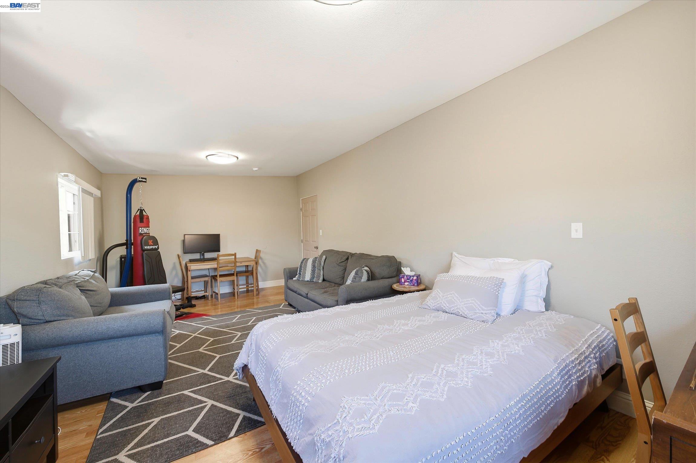 442 James Street Livermore, CA 94551 - Photo 18 of 28 a bedroom with bed and a couch