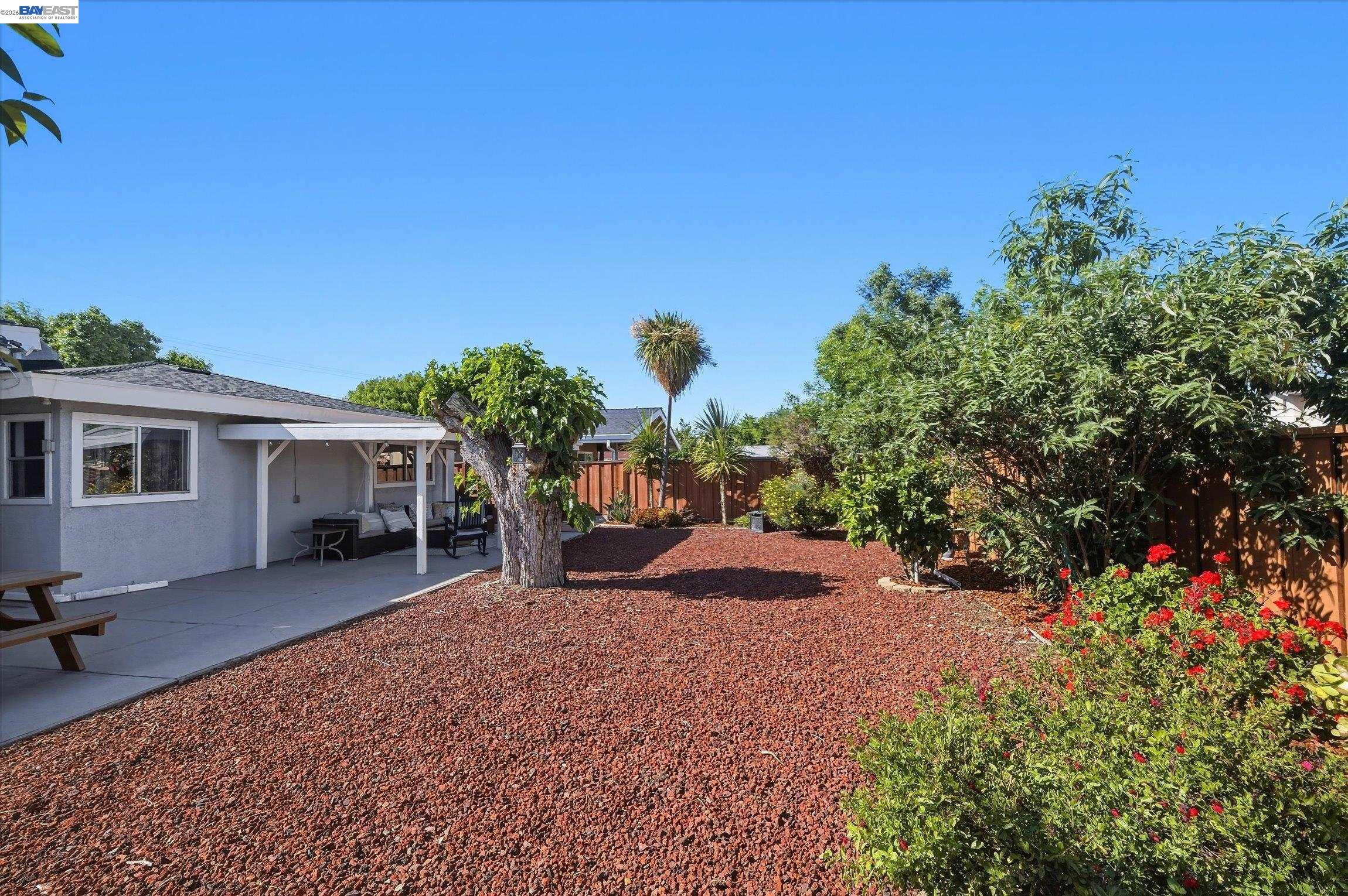 442 James Street Livermore, CA 94551 - Photo 19 of 28 a view of a house with backyard and a tree