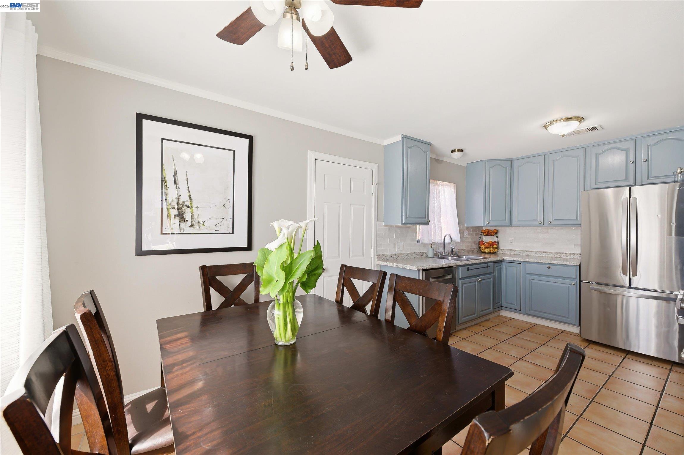 442 James Street Livermore, CA 94551 - Photo 4 of 28 a kitchen with furniture wooden floor and stainless steel appliances